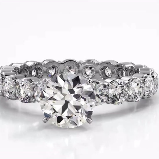 Shared Prong Eternity Style Engagement Ring