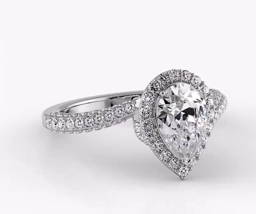 Exquisite Pear Shaped Halo Diamond Engagement Ring